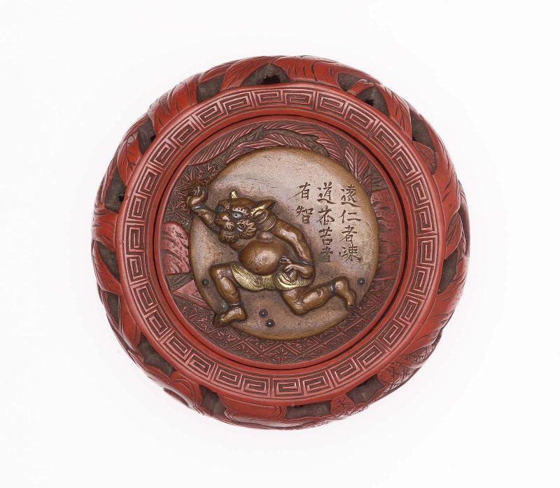 Kagami netsuke with design of oni fleeing beans, with an inscription; bowl with Chinese boys playing
