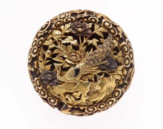 Kagami netsuke with design of peacock and peonies