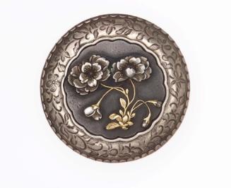 Kagami netsuke with design of peonies