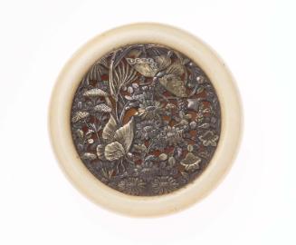 Kagami netsuke with design of butterflies and autumn plants
