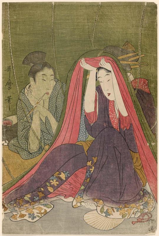 Couple under Mosquito Net