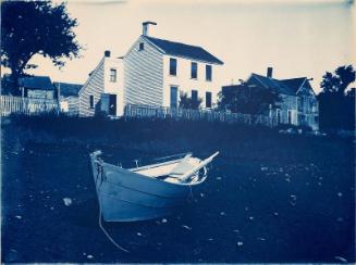 White Clapboard House and Dory