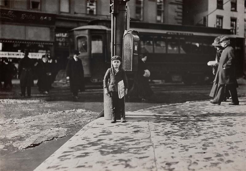 Newsboy on Street Corner
