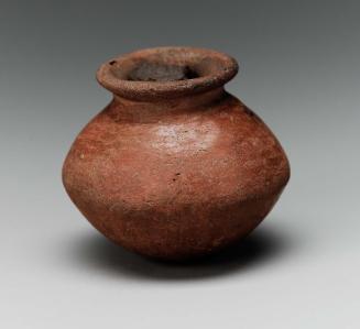 Small squat jar with contents