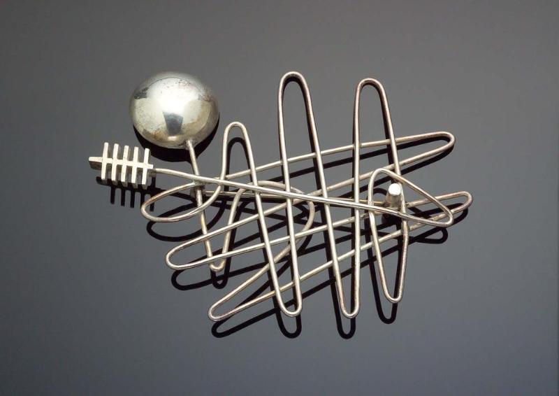 Calligraphy brooch