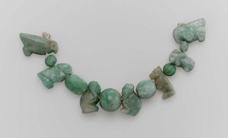 String of beads and amulets