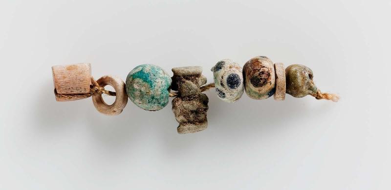 String of beads and amulet