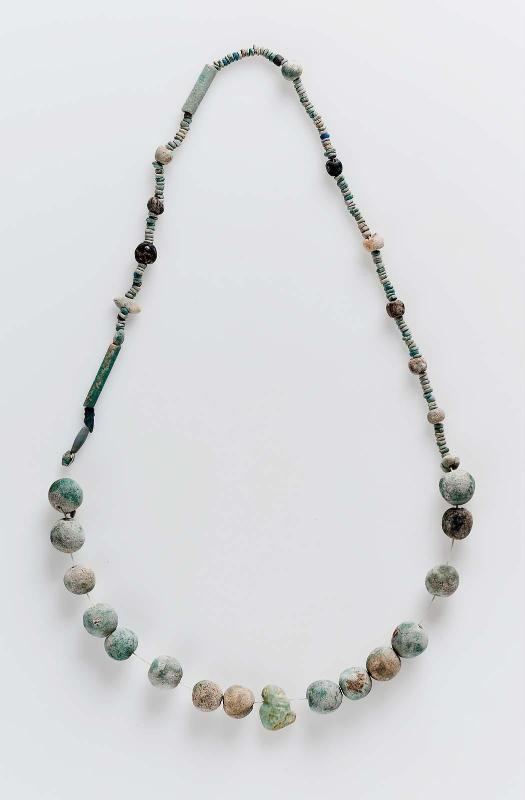 String of beads and amulet