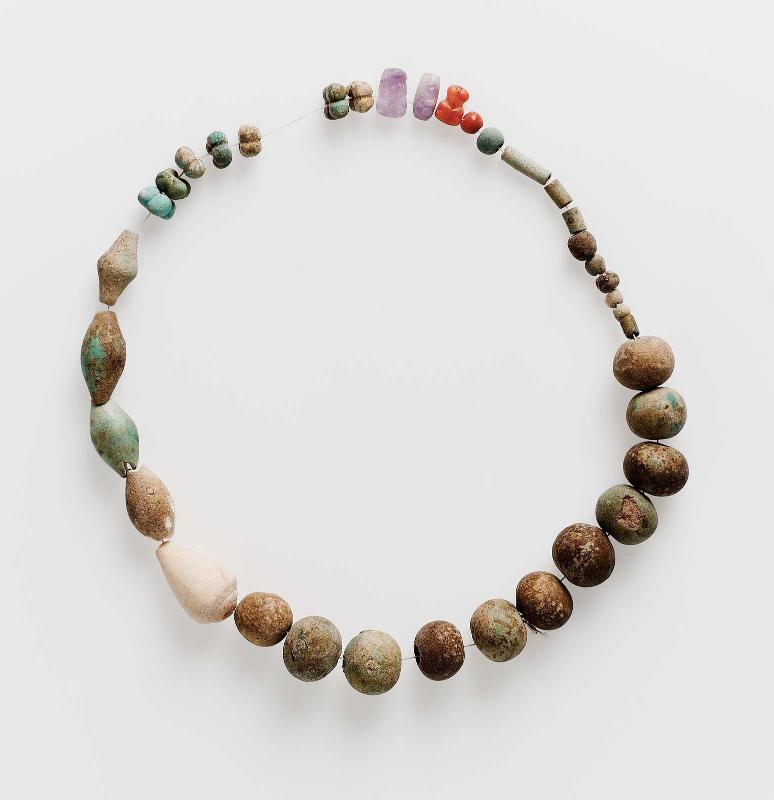 String of beads and amulets