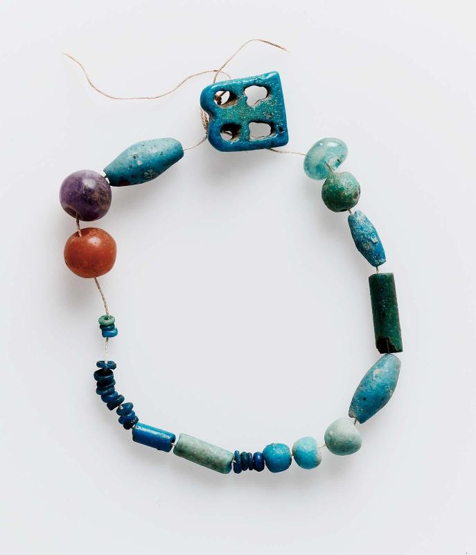 String of beads and amulet