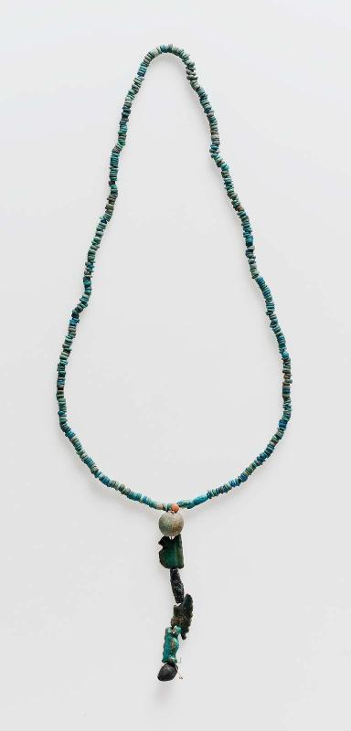 String of beads and amulets