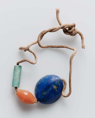 Seal amulet and beads on original cord