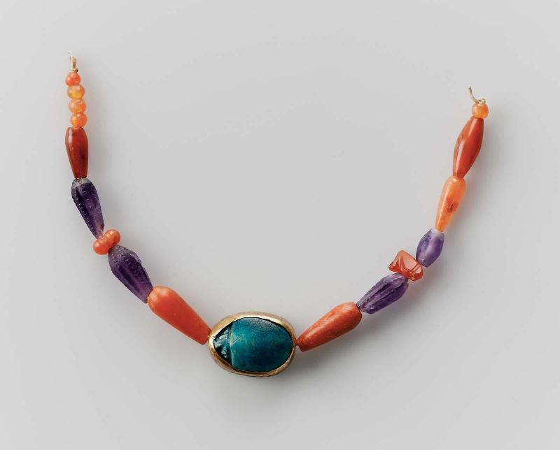 String of beads with mounted scarab
