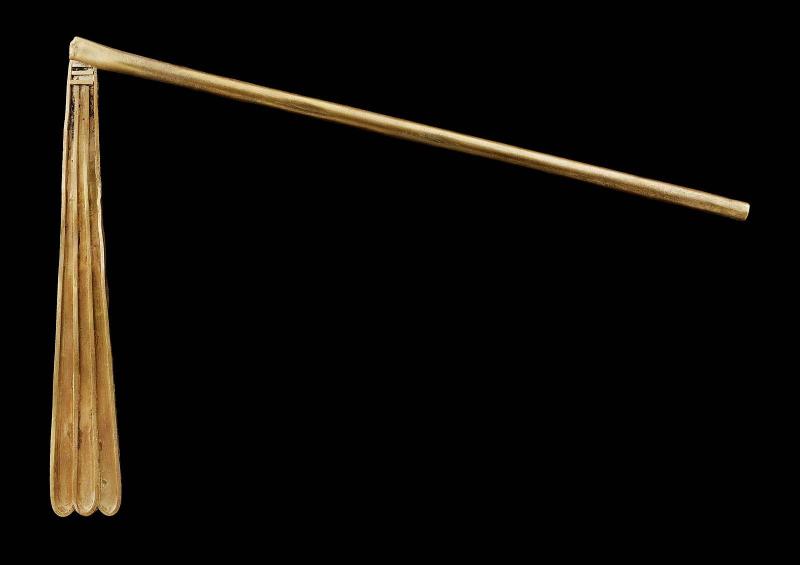 Gold model of a flail