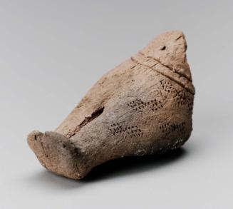 Female figurine, legs and lower body